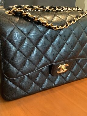 NEW Chanel Large Classic flap in Black Cavier